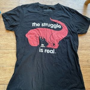 Black dinosaur t-shirt.